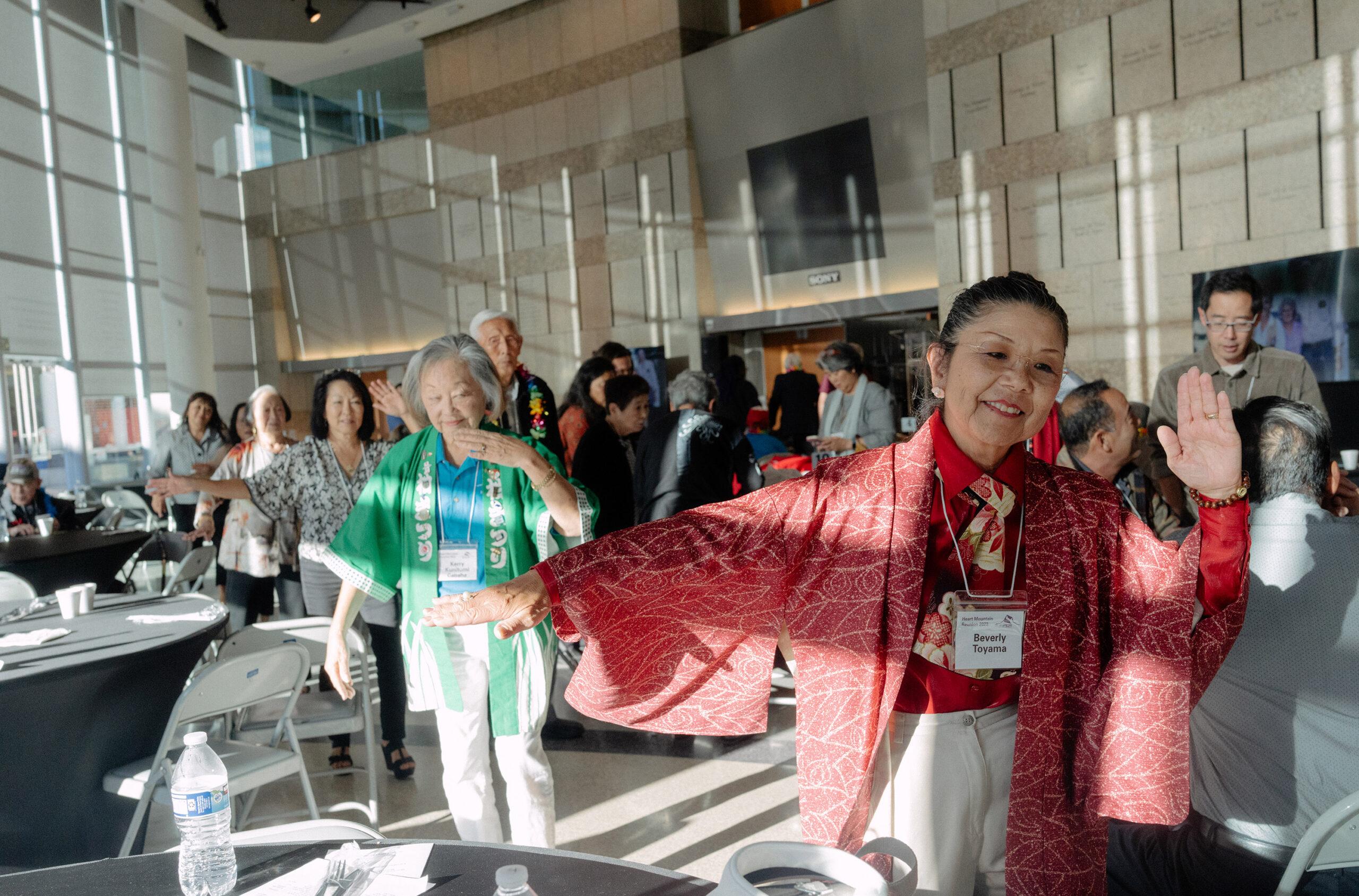Survivors of Heart Mountain and their descendants join in a cultural dance at the end of the annual Heart Mountain annual reunion at the Japanese American National Museum in Los Angeles.